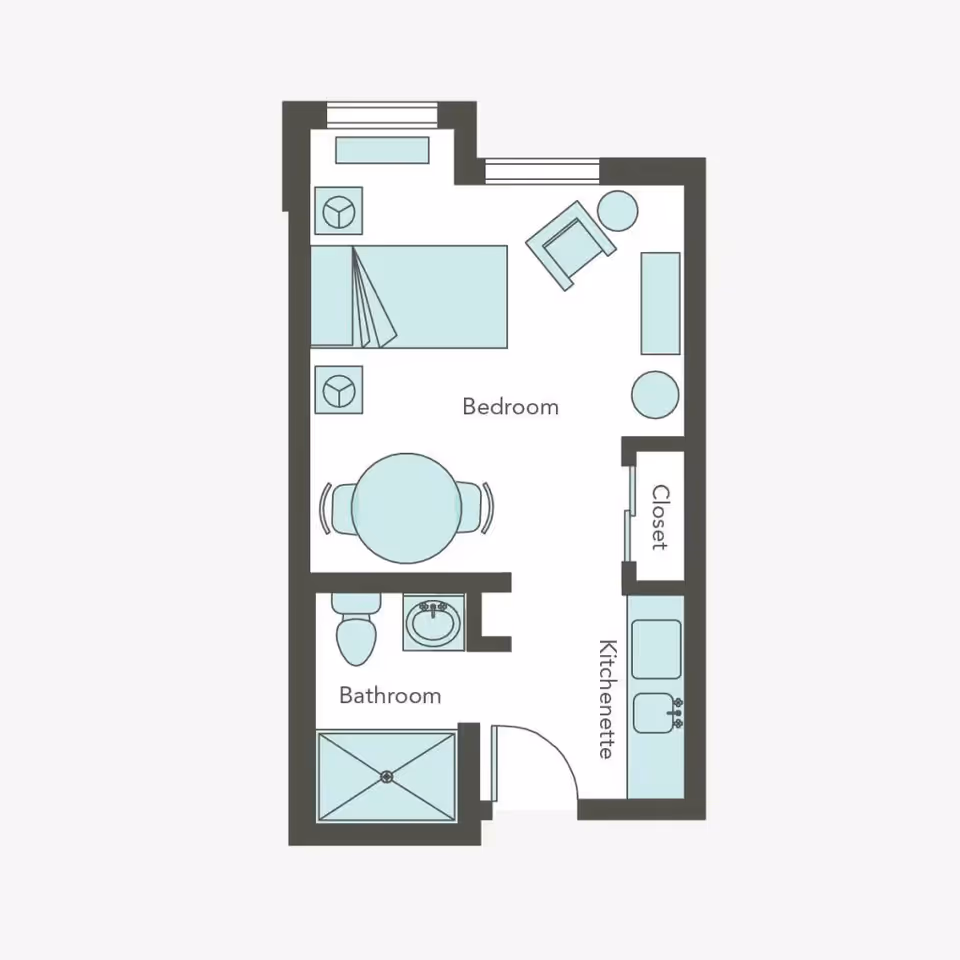 Floor plan of a small living space labeled Aegis Lodge, showing a bedroom with a bed, two nightstands, a chair, a small table with two chairs, a closet, a kitchenette with a sink and stove, and a bathroom with a toilet, sink, and shower.