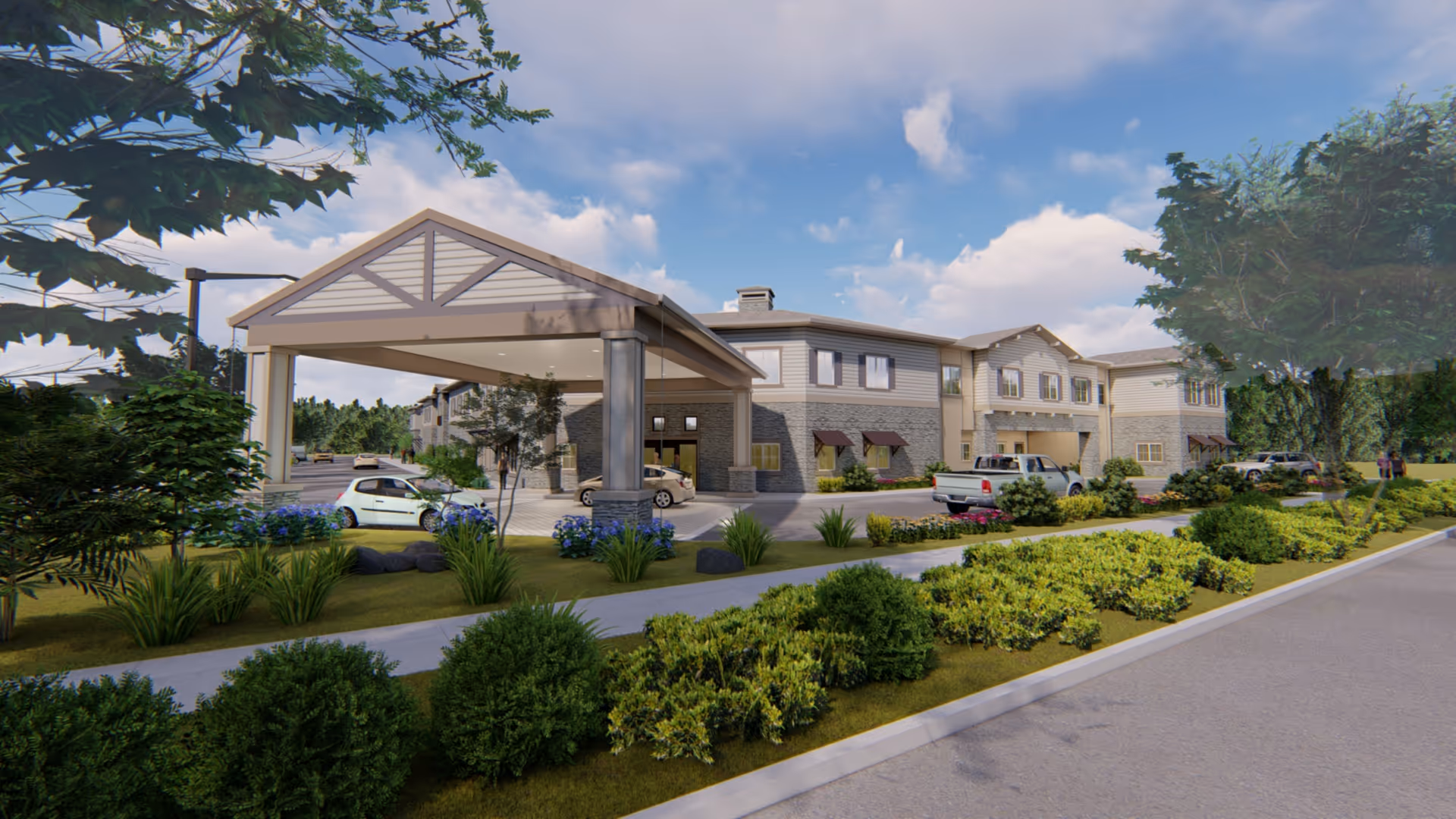 Front exterior of a two-story senior living building with a covered entrance, parked cars, and landscaped grounds.