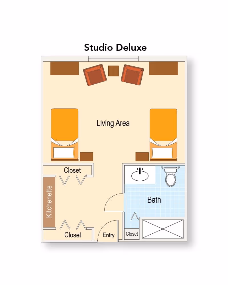 Floor plan of a Studio Deluxe unit at Grand Villa of Deerfield Beach showing a living area with two beds, two chairs, a kitchenette, closets, an entry, and a bathroom with a sink, toilet, and shower.