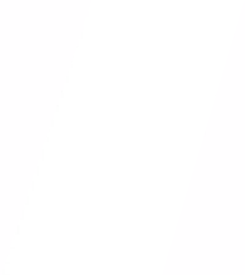 A modern kitchen featuring a large island with a white countertop and wooden base, surrounded by four black bar stools. The kitchen has white cabinetry, stainless steel appliances including a refrigerator and oven, and a window with a view of greenery outside. Pendant lights hang above the island, and there are decorative items such as a bowl of fruit and plants on the counter.