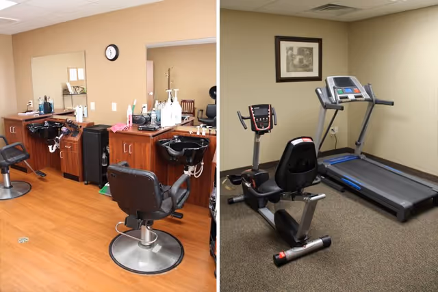 Left side shows a salon area with two black salon chairs, sinks, and wooden cabinets with hair care products. Right side shows a small exercise room with a treadmill and a recumbent exercise bike on a carpeted floor, with a framed picture on the wall.