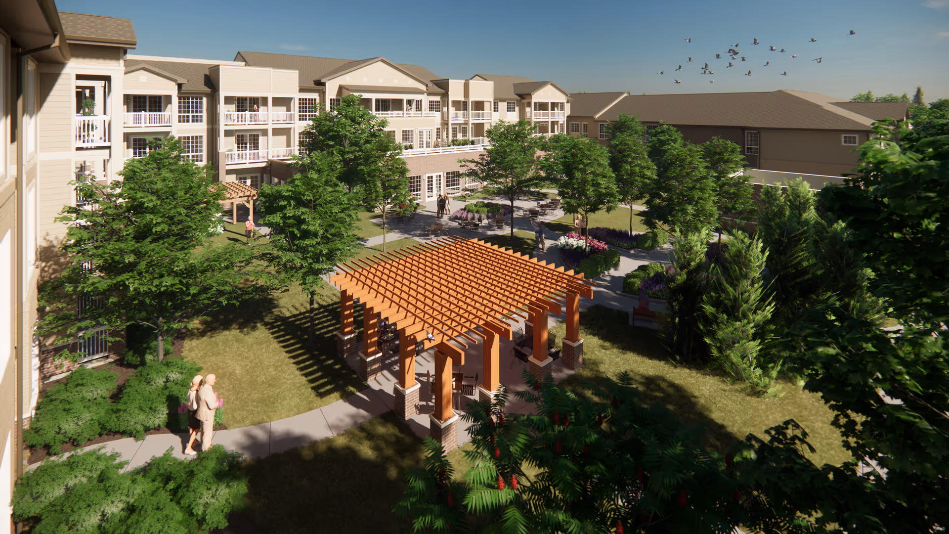 Outdoor courtyard with a wooden pergola, walking paths, trees and a multi-story senior living building in the background.