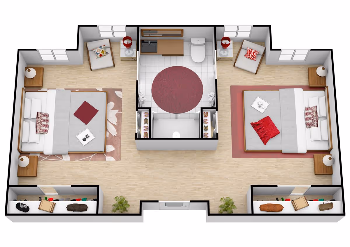 3D floor plan showing two bedrooms separated by a central bathroom. Each bedroom has a bed, two nightstands with lamps, a chair with a side table, and a rug. The bathroom includes a toilet, sink, shower, and a round rug. Both bedrooms have closets with clothes and storage items.