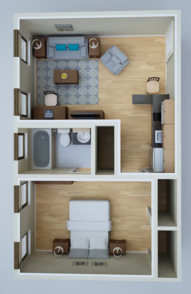Top-down view of a one-bedroom apartment floor plan featuring a living room with a sofa, armchair, coffee table, desk, and TV stand; a kitchen area with appliances and a small dining chair; a bathroom with a bathtub, toilet, and sink; and a bedroom with a bed and two nightstands.