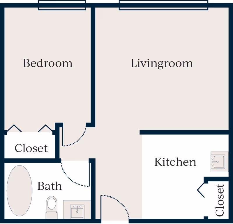 One-bedroom apartment floor plan showing a bedroom, living room, kitchen, bathroom, and closets.