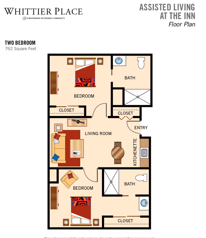 Floor plan of a two-bedroom assisted living apartment at Whittier Place, showing two bedrooms each with a bed and closet, two bathrooms with sink, toilet, and shower, a living room with sofa, chair, and table, and a kitchenette with a round dining table and sink. The total area is 762 square feet.