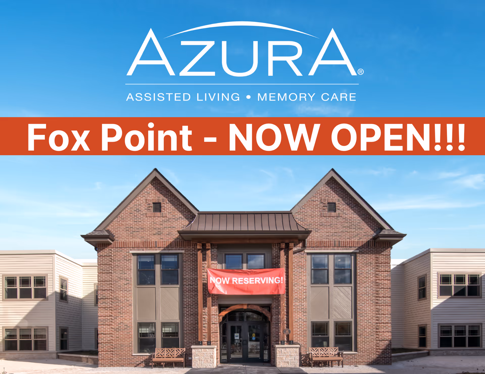 Front exterior of a brick assisted living facility with an 'Azura' logo and banners reading 'Fox Point - NOW OPEN!!!' and 'NOW RESERVING!'.