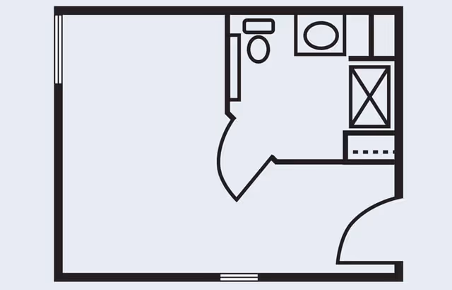Architectural floor plan showing a small room layout with a bathroom that includes a toilet, sink, and shower area.