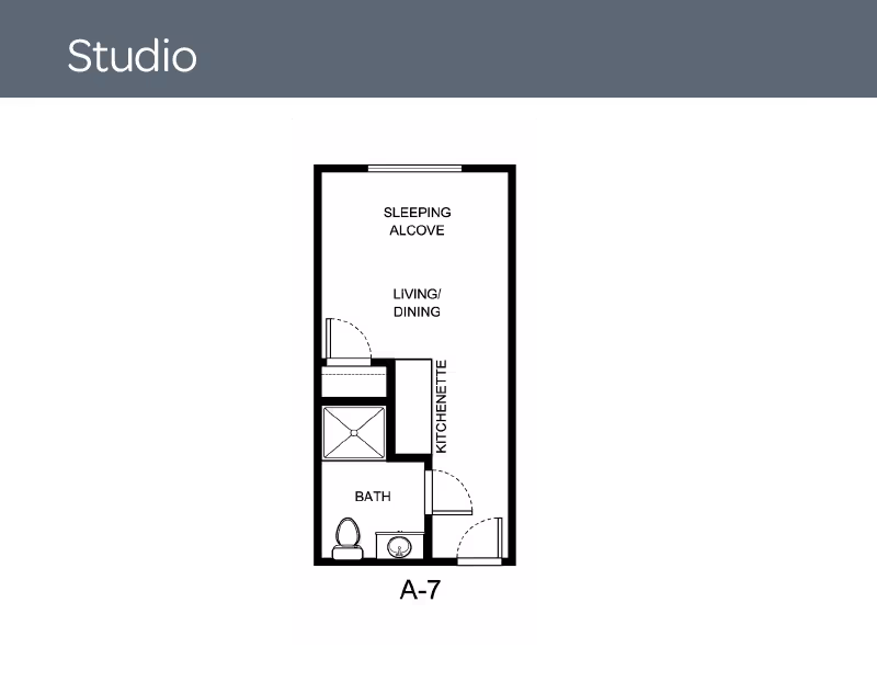 Floor plan of a studio apartment labeled A-7 showing a sleeping alcove, living/dining area, kitchenette, and a bathroom with a toilet and sink.