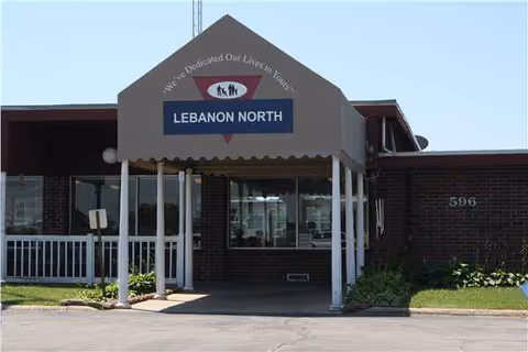 Front entrance of Lebanon North Nursing and Rehab, brick building with canopy sign.