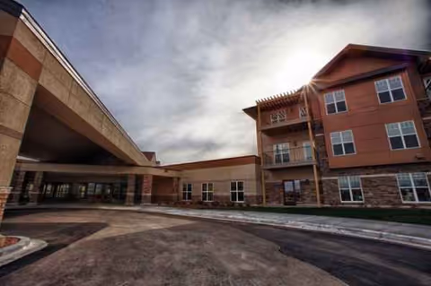 Exterior view of The Fountains at Hosanna with front entrance and driveway.