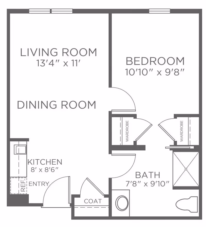 Floor plan of a one-bedroom apartment at Woodland Terrace showing a living room measuring 13 feet 4 inches by 11 feet, a dining room area, a kitchen measuring 8 feet by 8 feet 6 inches, an entry, a coat closet, a bedroom measuring 10 feet 10 inches by 9 feet 8 inches with two wardrobes, and a bathroom measuring 7 feet 8 inches by 9 feet 10 inches with a toilet and shower.