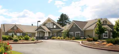 Front exterior view of Brookdale Bend senior living community with a circular driveway.