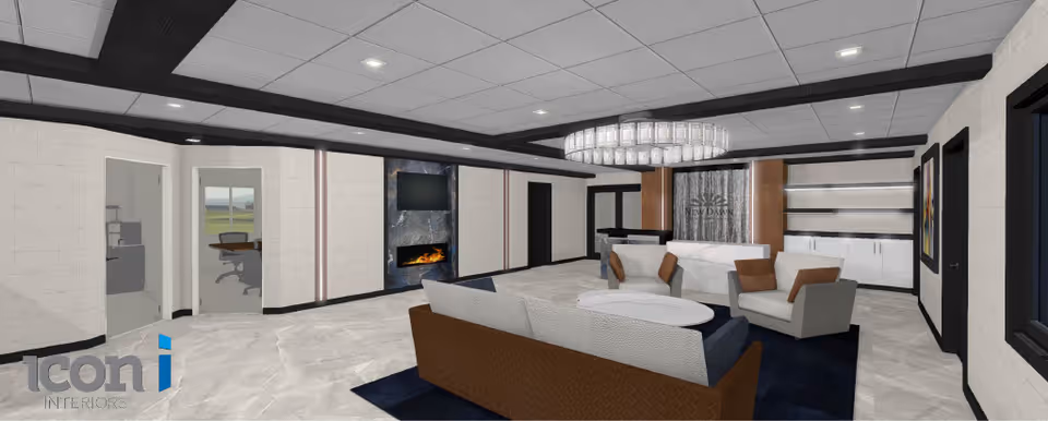 A modern and spacious interior lounge area with a large chandelier, a fireplace beneath a mounted flat-screen TV, a reception desk with the New Dawn logo behind it, and comfortable seating including a sofa and armchairs arranged around a round coffee table. The room features light-colored walls and flooring with dark ceiling beams and trim.