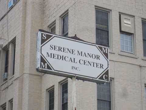 Exterior view of a building with Serene Manor Medical Center sign.