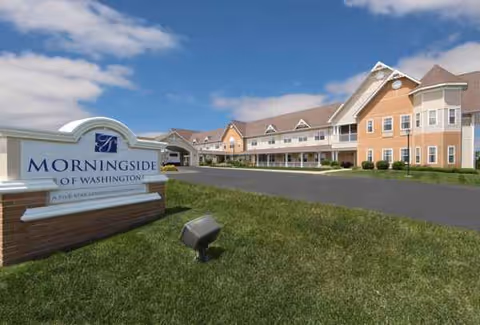 Exterior view of Morningside of Washington senior living campus with driveway and entrance.