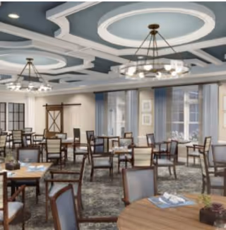 Spacious dining room with multiple round and rectangular tables, upholstered chairs, chandeliers, and decorative coffered ceiling.