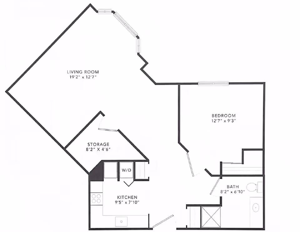 Floor plan layout of a living space showing a living room, bedroom, kitchen, bathroom, and storage area with dimensions.