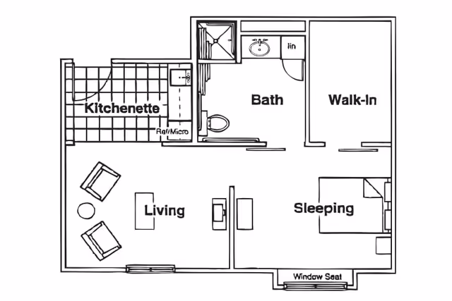 Black and white floor plan of a living space at Andover Court showing a kitchenette, living area with two chairs and a table, a bathroom with a shower, toilet, and sink, a walk-in closet, and a sleeping area with a bed and window seat.