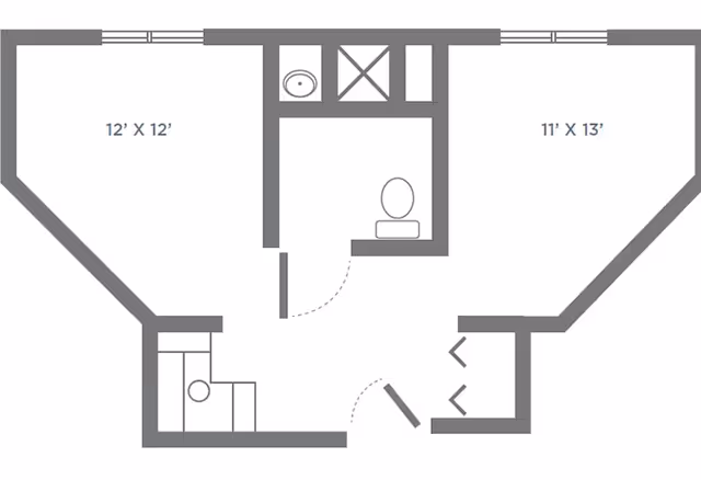 Floor plan layout showing two rooms measuring 12 by 12 feet and 11 by 13 feet, with a bathroom in the center that includes a toilet, sink, and shower. There is also a small kitchen area with a sink and counter space.