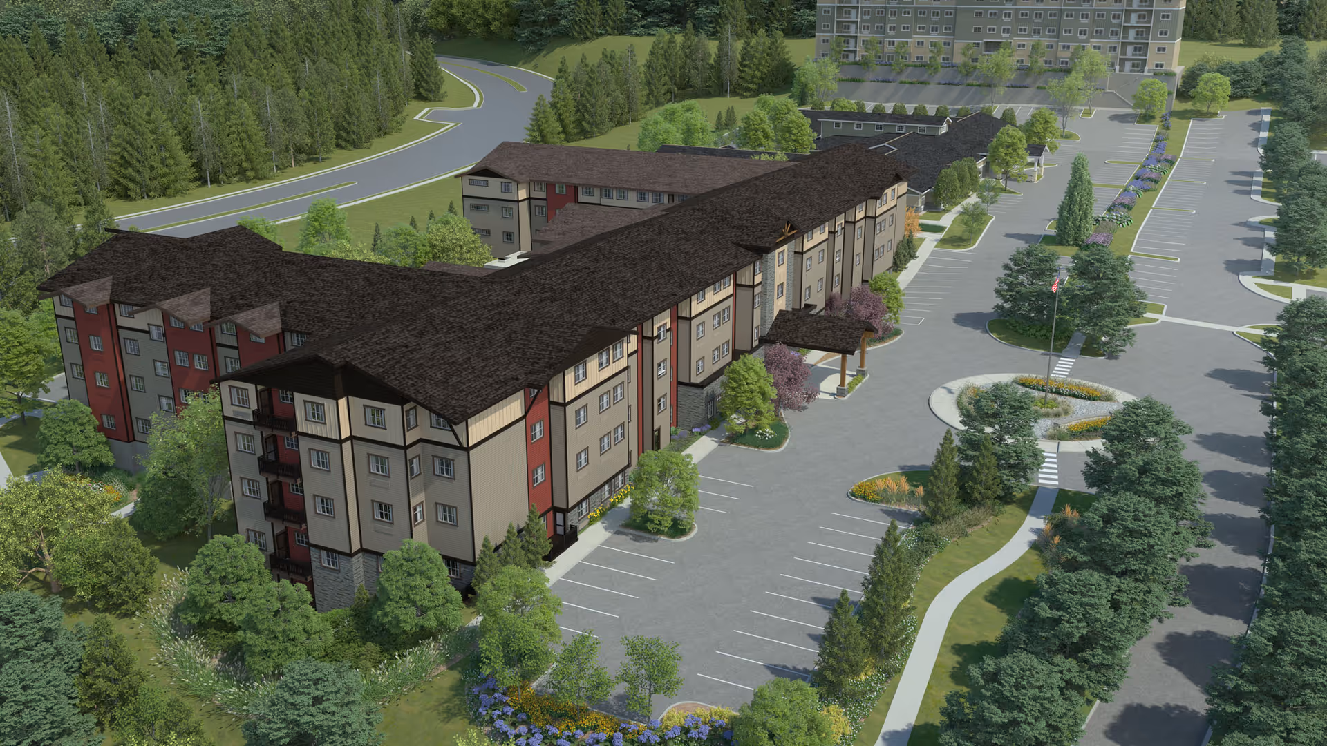 Aerial view of a multi-story memory care building with landscaped grounds and a large parking lot.