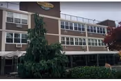 Exterior view of Silver Lake Specialized Care Center, a brick building with trees.