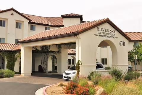 Front view of Silver Sky at Deer Springs Assisted Living entrance with porte-cochere.