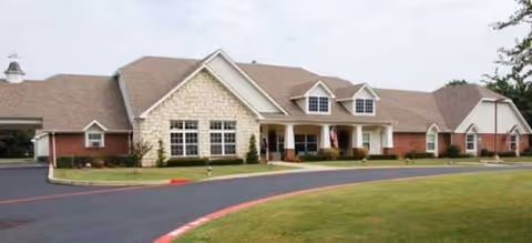 Brookdale Bloomington senior living facility exterior with brick facade and front entrance.