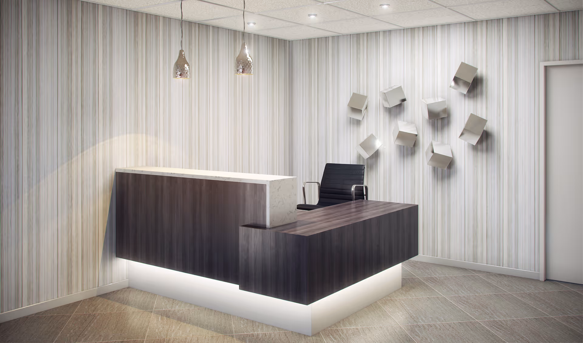 Modern reception desk area with dark wood and white marble countertop, a black office chair behind the desk, pendant lights hanging from the ceiling, and a wall decorated with metallic cube sculptures.