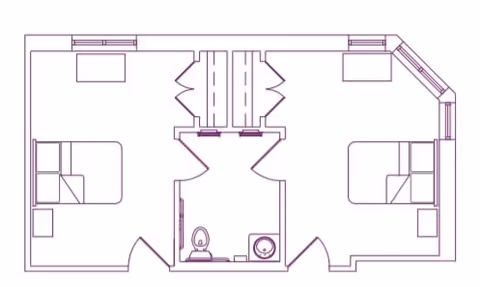 Architectural floor plan showing two adjacent bedrooms with beds and closets, separated by a shared bathroom with a toilet and sink.