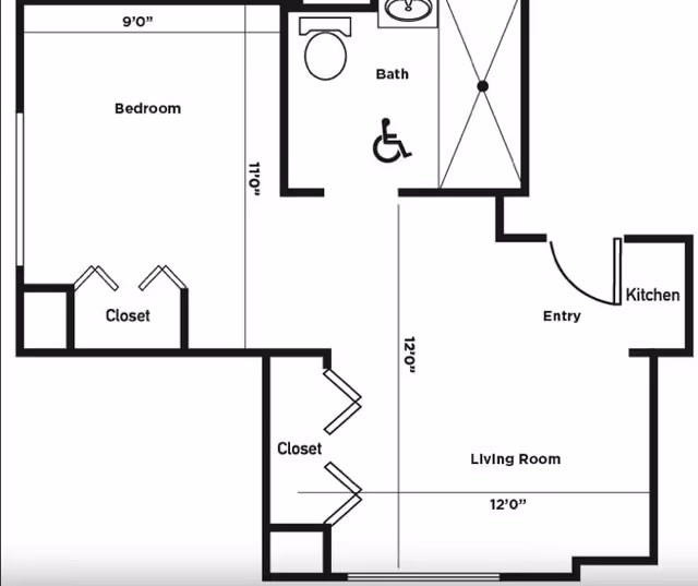 Black and white architectural floor plan of a senior living unit at Carriage Court of Kenwood showing a bedroom with closet, a bathroom with accessible features, an entry area, a kitchen, a living room, and additional closets.