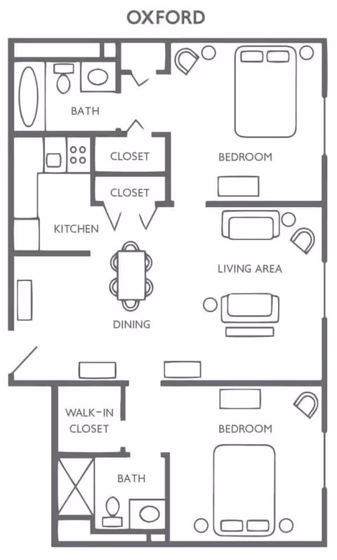 Floor plan labeled Oxford showing two bedrooms, two bathrooms, a kitchen, dining area, living area, closets, and a walk-in closet.
