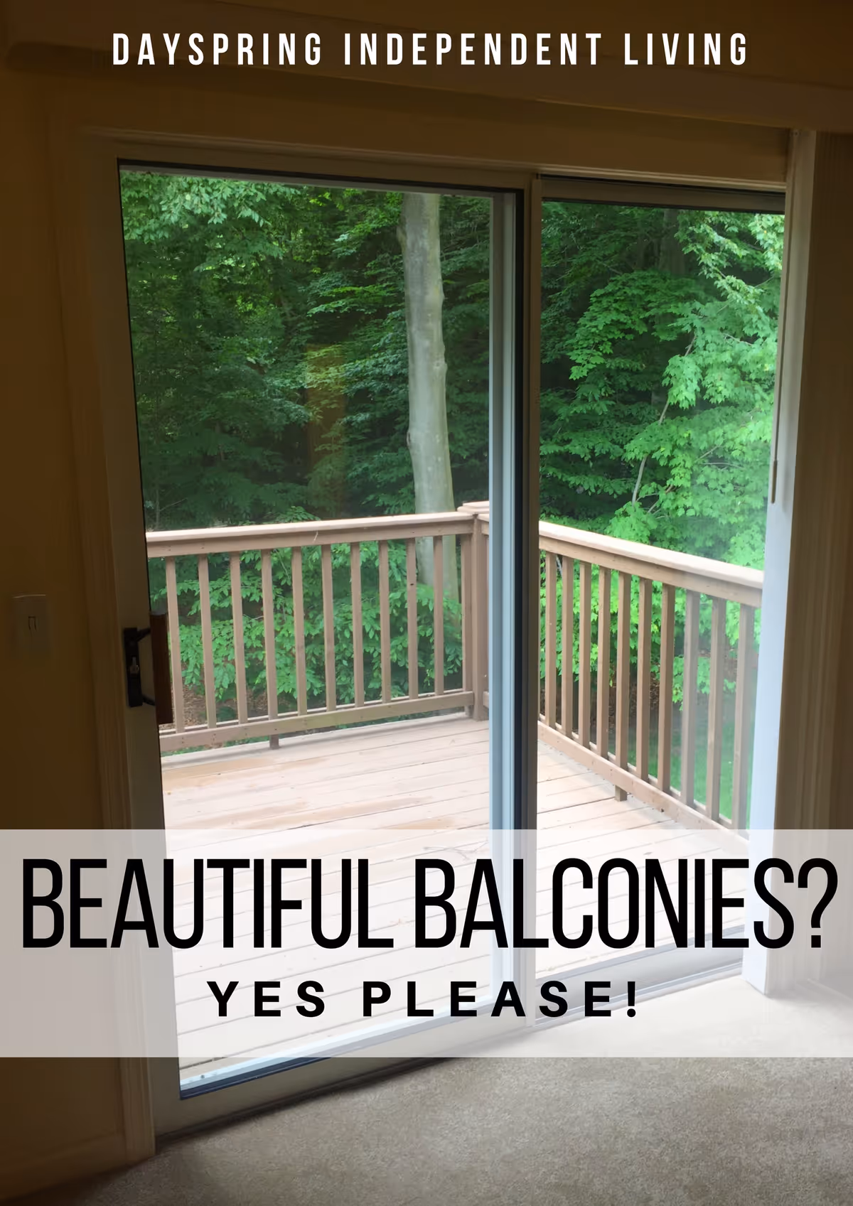 View through a sliding glass door showing a wooden balcony railing and lush green trees outside.