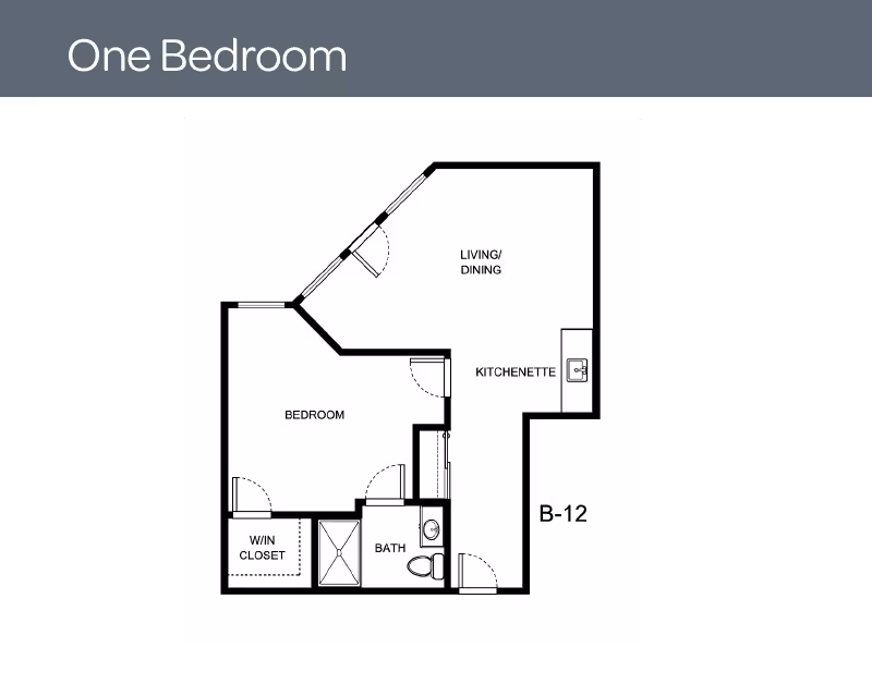 Floor plan of a one-bedroom unit at Holiday Devonshire Estates showing a bedroom with a walk-in closet, a bathroom, a kitchenette, and a combined living and dining area.