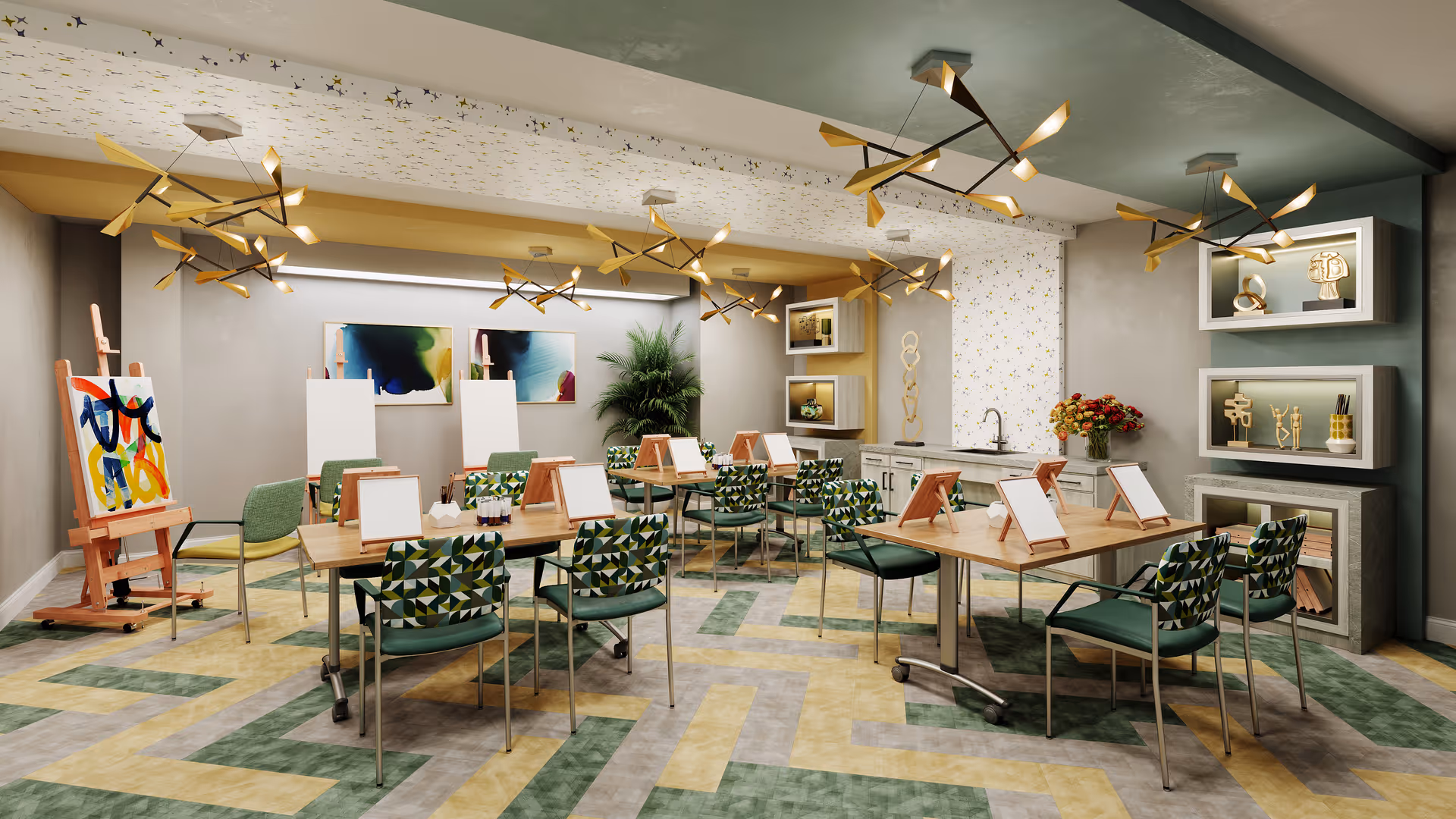 A bright and modern art activity room with multiple tables and chairs arranged for painting. Each table has easels with blank canvases and painting supplies. The room features contemporary light fixtures, abstract artwork on the walls, decorative shelves with sculptures, and a patterned carpet in green and yellow tones.