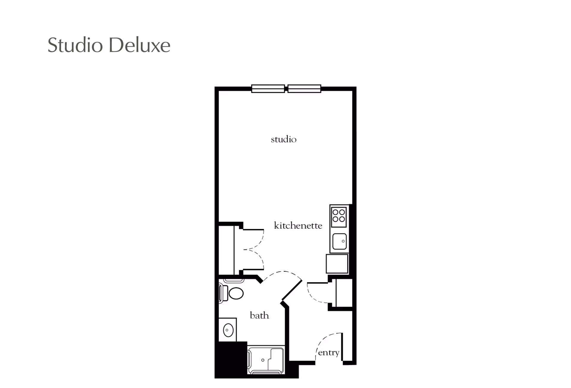 Black-and-white floor plan labeled 'Studio Deluxe' showing a studio room with a kitchenette, bathroom, and entry.