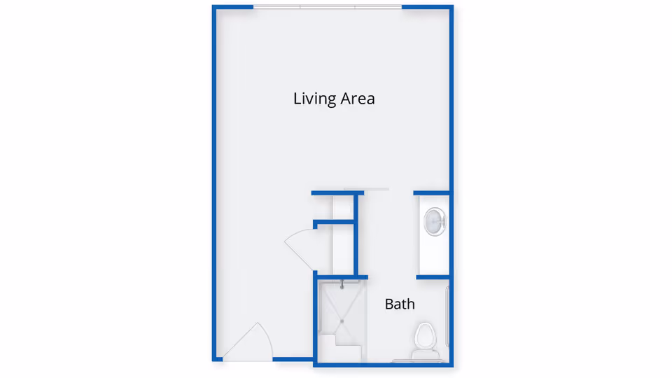 Floor plan layout showing a living area and a bathroom with a shower, toilet, and sink.