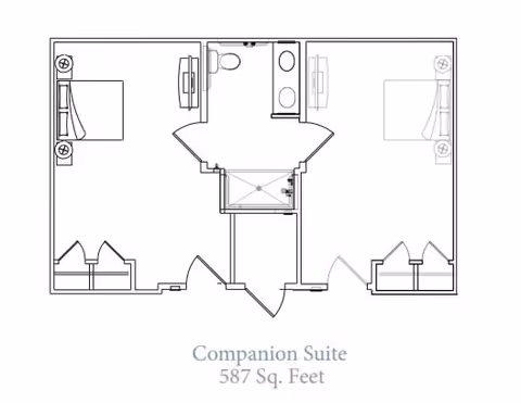 Architectural floor plan of a companion suite measuring 587 square feet, showing two bedrooms each with a bed and closet, a shared bathroom with two sinks and a toilet, and a central entry area.