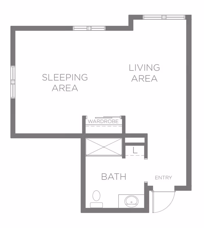 Floor plan layout showing a sleeping area, living area, bath with toilet and sink, wardrobe, and entry door.