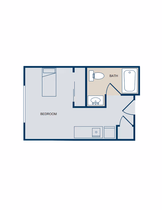 Floor plan of a small living space showing a bedroom with a bed, a bathroom with a toilet, sink, and bathtub, and a small kitchenette area with a sink and refrigerator.