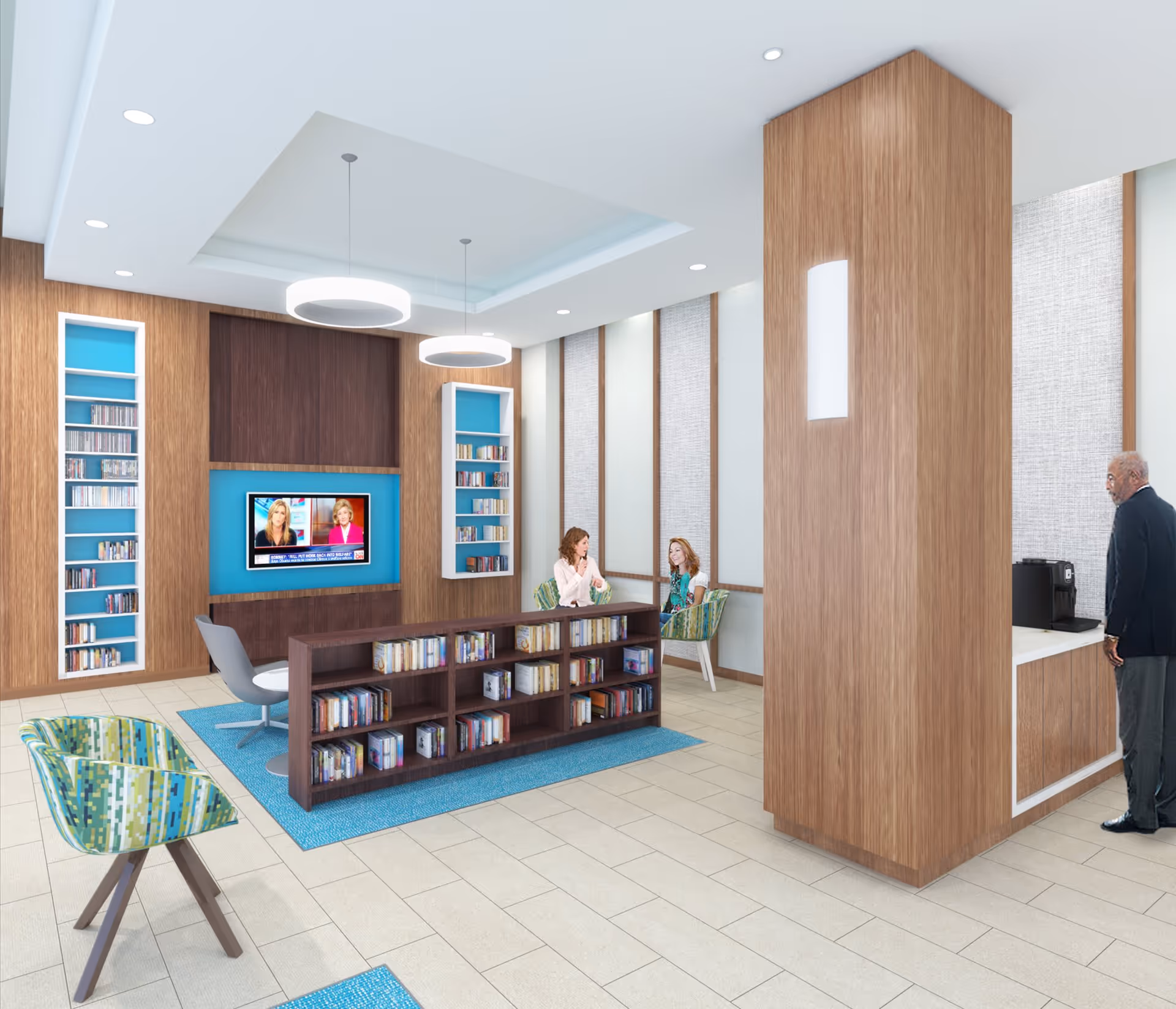 A modern senior living facility common area with wood-paneled walls and built-in bookshelves filled with books. Two women are seated and talking near the back wall, which has tall windows with blinds. A flat-screen TV is mounted on the wall above a low bookshelf. A man is standing near a coffee machine on the right side. The room has light tile flooring and contemporary circular ceiling lights.