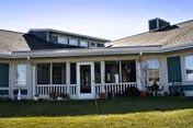 Front view of Prairie View senior living facility with a covered porch.