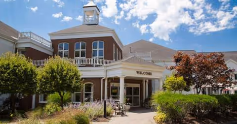 Front view of Mulberry Gardens of Southington with welcoming entrance and landscaped surroundings.
