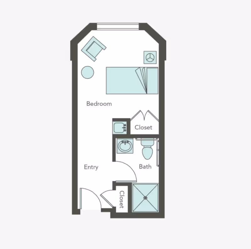 Floor plan of a small living space at Aegis Living San Francisco showing a bedroom with a bed, chair, and table, an entry area, a bathroom with a sink, toilet, and shower, and two closets.