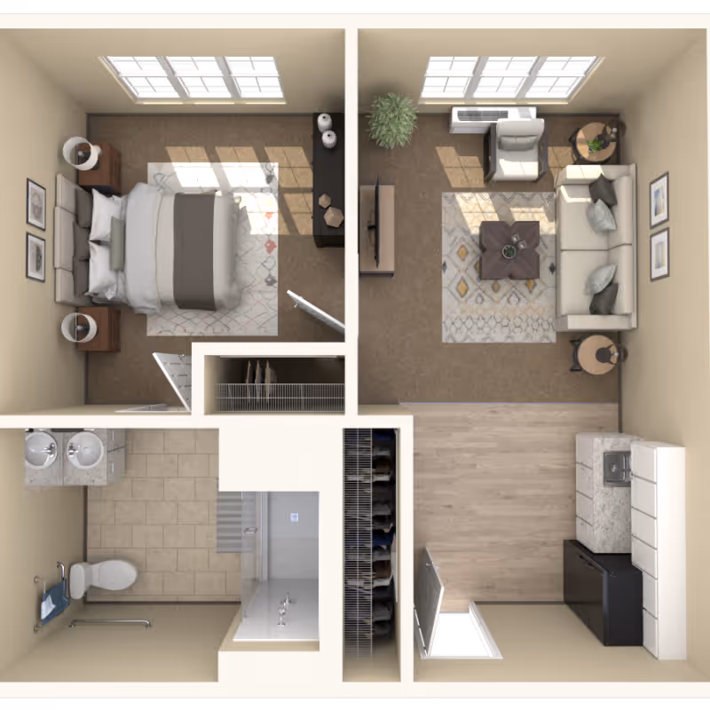 Top-down view of a senior living apartment floor plan showing a bedroom with a bed, nightstands, and dresser; a living room with a sofa, armchair, coffee table, TV, and side tables; a kitchen area with cabinets, countertop, sink, and refrigerator; and a bathroom with a toilet, double sink vanity, and shower. There is also a closet space between the bedroom and bathroom.