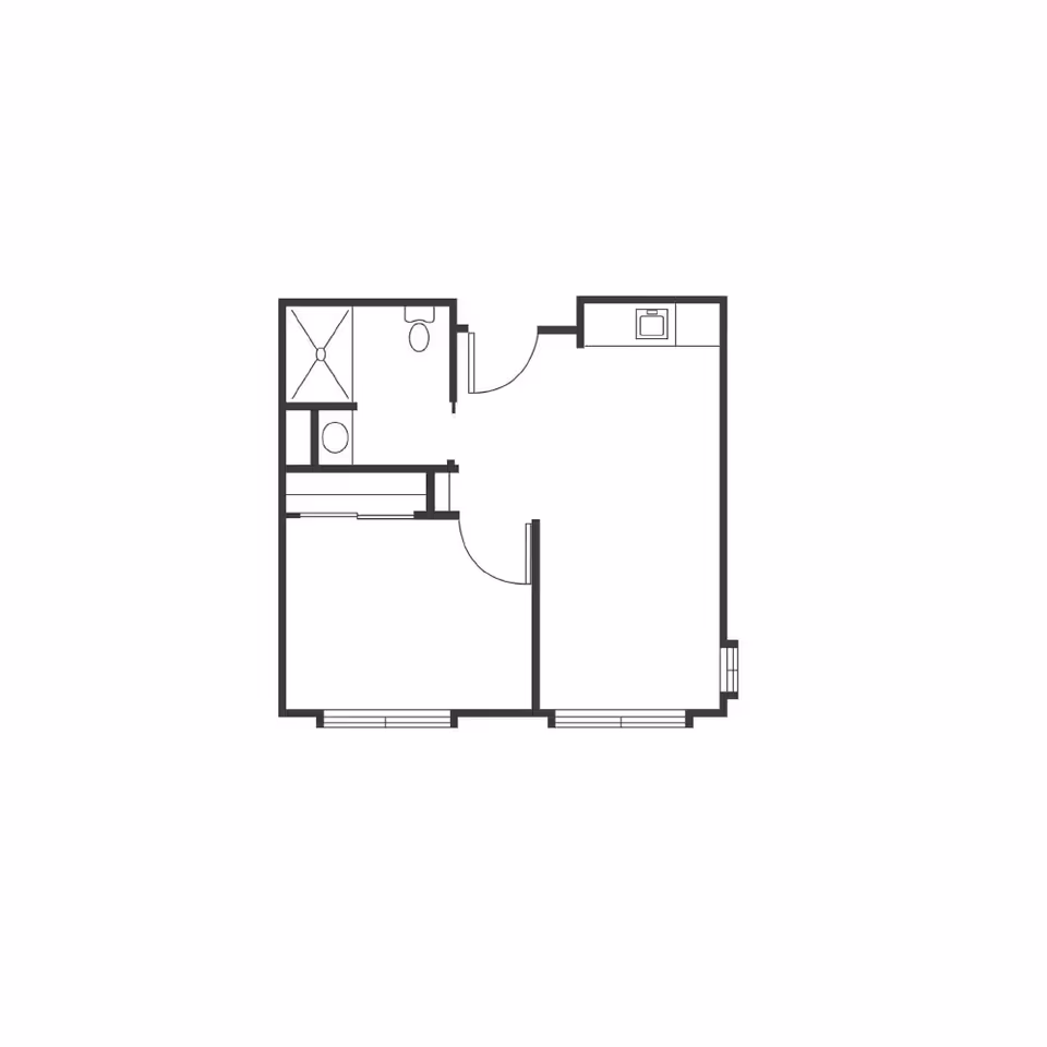 Black-and-white floor plan of a small one-bedroom apartment showing a living area, bedroom, bathroom, and kitchenette.