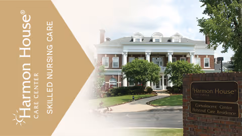 Exterior view of Harmon House Care Center, a large brick building with white columns and a well-maintained lawn and trees in front. A brick sign near the entrance reads Harmon House Care Center, Convalescent Center, Personal Care Residence.