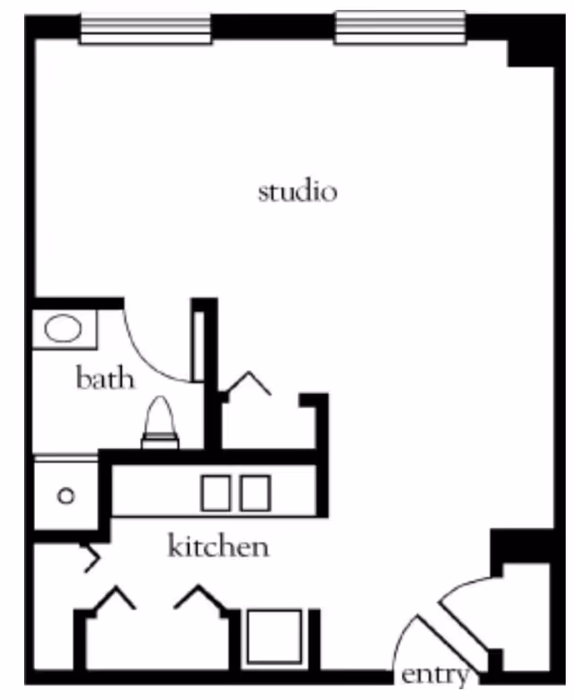 Floor plan of a studio apartment with labeled areas including an entry, kitchen, bath, and a large studio living space.