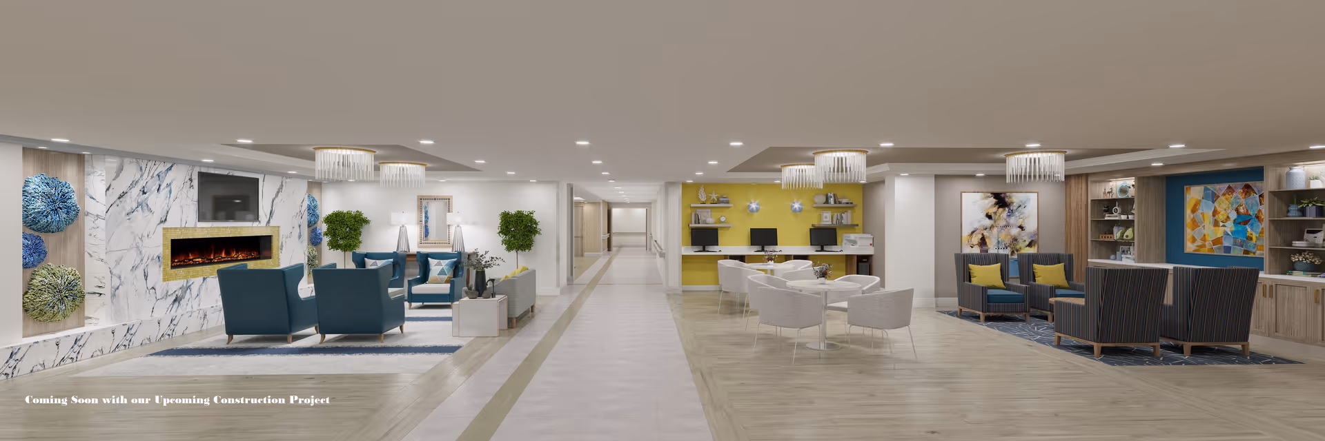A spacious and modern common area in an assisted living facility featuring multiple seating arrangements with armchairs and sofas, decorative wall art, a built-in electric fireplace, and a long hallway leading to other rooms. The room has a mix of wood and tile flooring, contemporary lighting fixtures, and a yellow accent wall with computers and shelves.