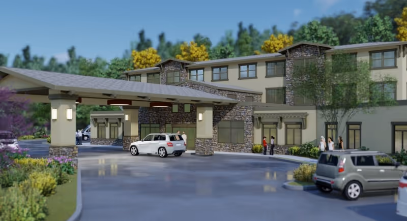 The Grove at Los Gatos Senior Living exterior with a covered entrance and cars.